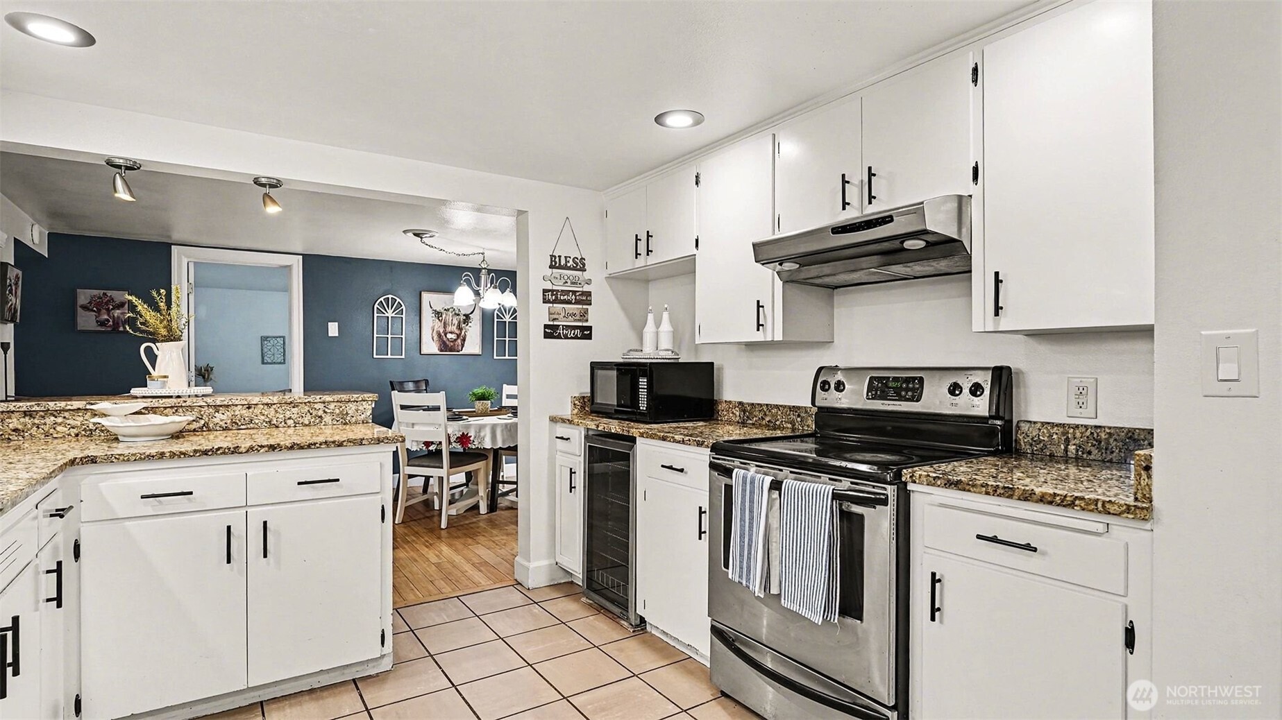 544 Simons Road Monroe, WA 98272 - Photo 10 of 34 a kitchen with stainless steel appliances granite countertop a stove and a sink