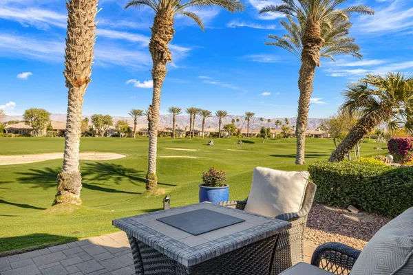 a view of a swimming pool with a mountain view