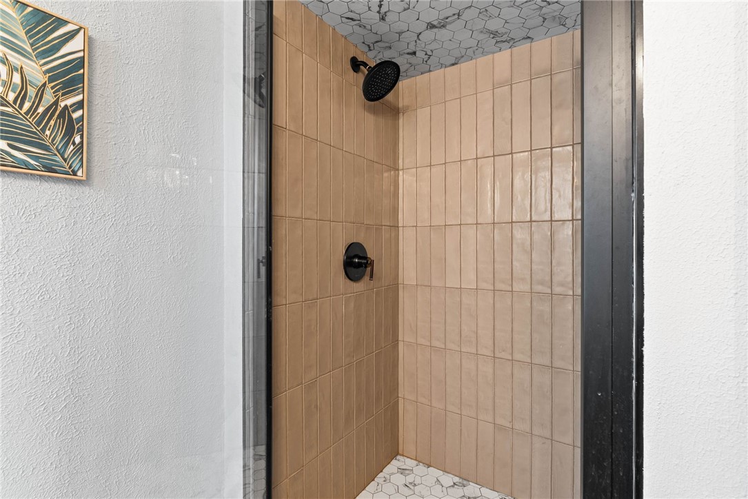 3211 Laguna Shores Road Corpus Christi, TX 78418 - Photo 16 of 29 a bathroom with a shower