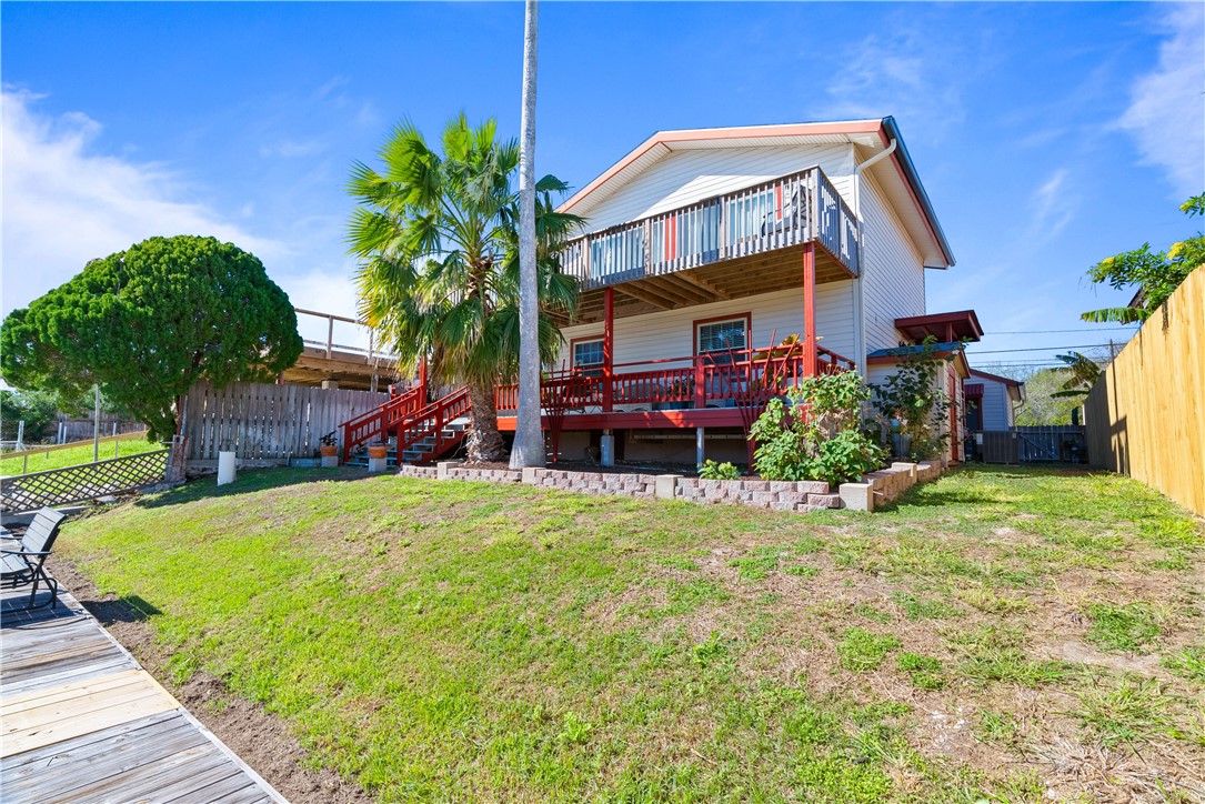 3211 Laguna Shores Road Corpus Christi, TX 78418 - Photo 3 of 29 a front view of house with yard