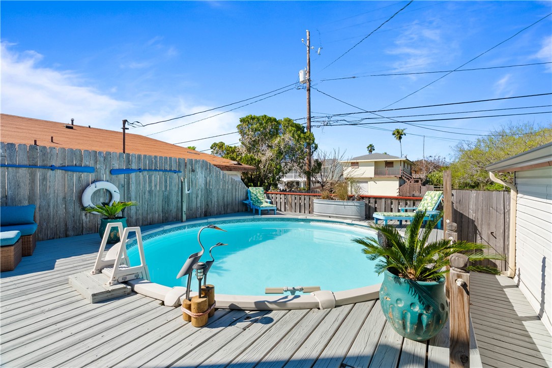 3211 Laguna Shores Road Corpus Christi, TX 78418 - Photo 4 of 29 a view of a backyard with sitting area