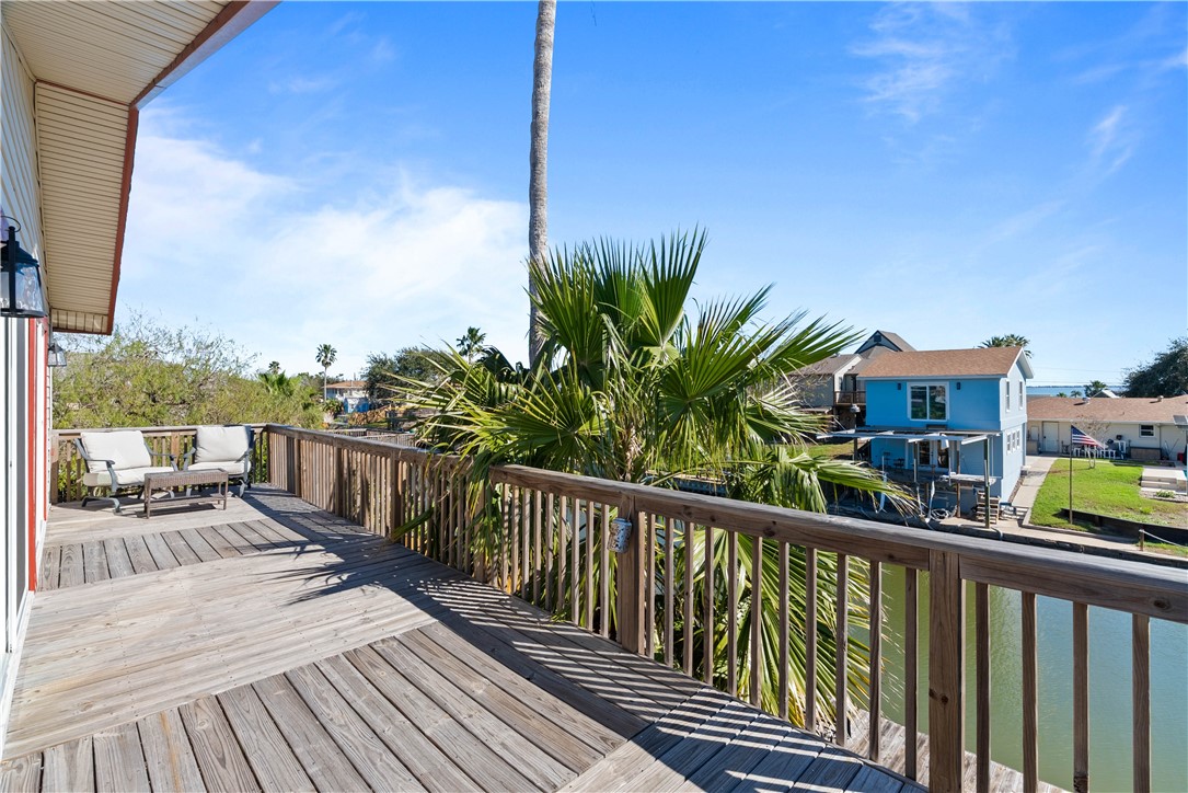 3211 Laguna Shores Road Corpus Christi, TX 78418 - Photo 7 of 29 a view of a balcony with wooden floor
