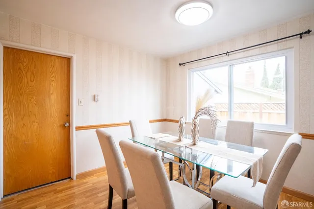 a kitchen with stainless steel appliances granite countertop a stove and cabinets