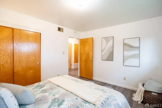 a room with a bed and a window