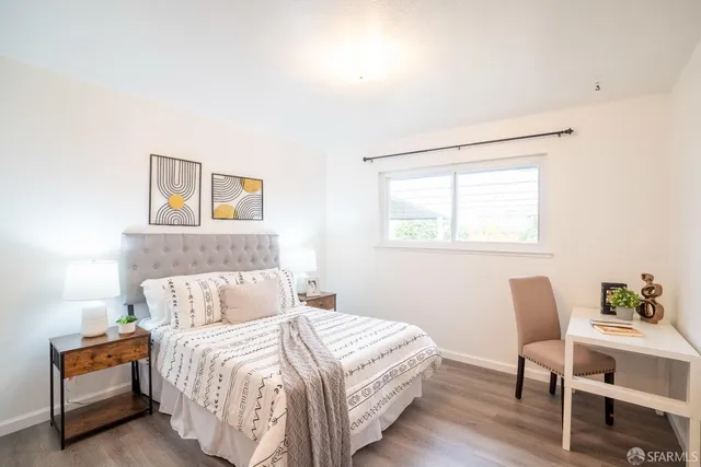 a view of a living room with furniture