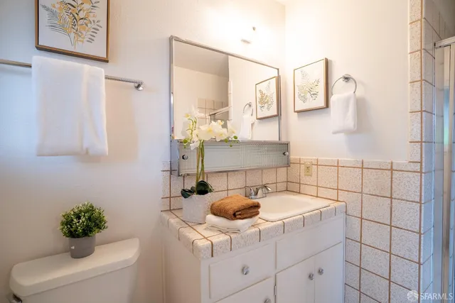 a bathroom with a sink and a shower