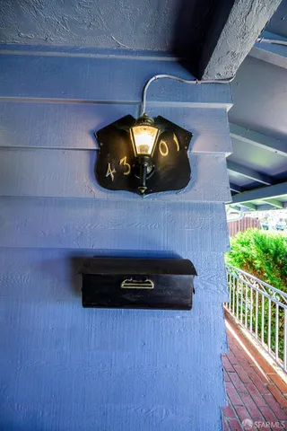 a view of a backyard with potted plants