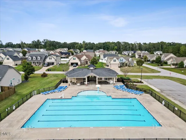 a view of a city with lawn chairs