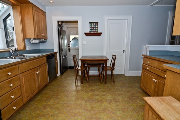 51 Dexter Road Lexington, MA 02420 - Photo 6 of 12 a room with a chair and a dresser