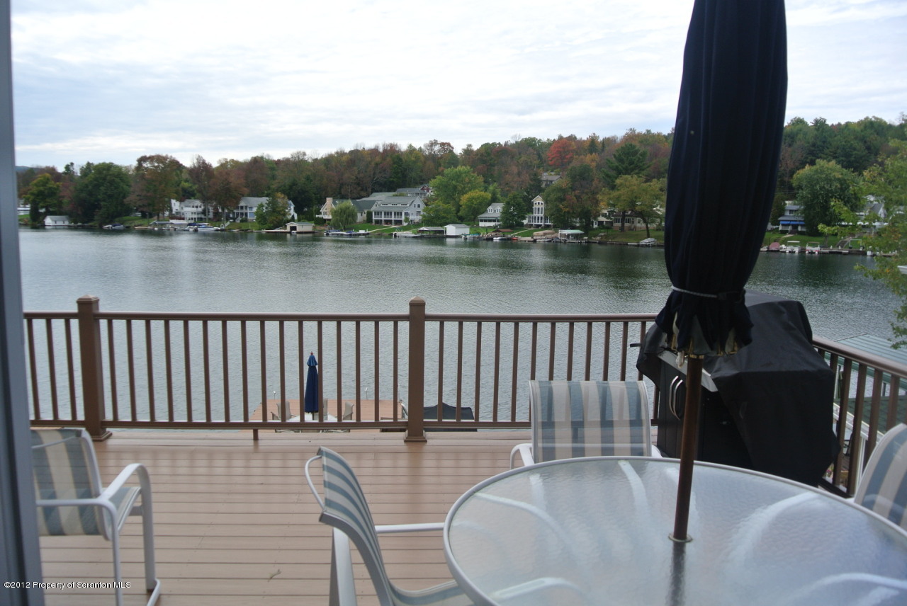 94 Lake Rd Lake Factoryville, PA 18419 - Photo 8 of 19 a view of a lake from a balcony