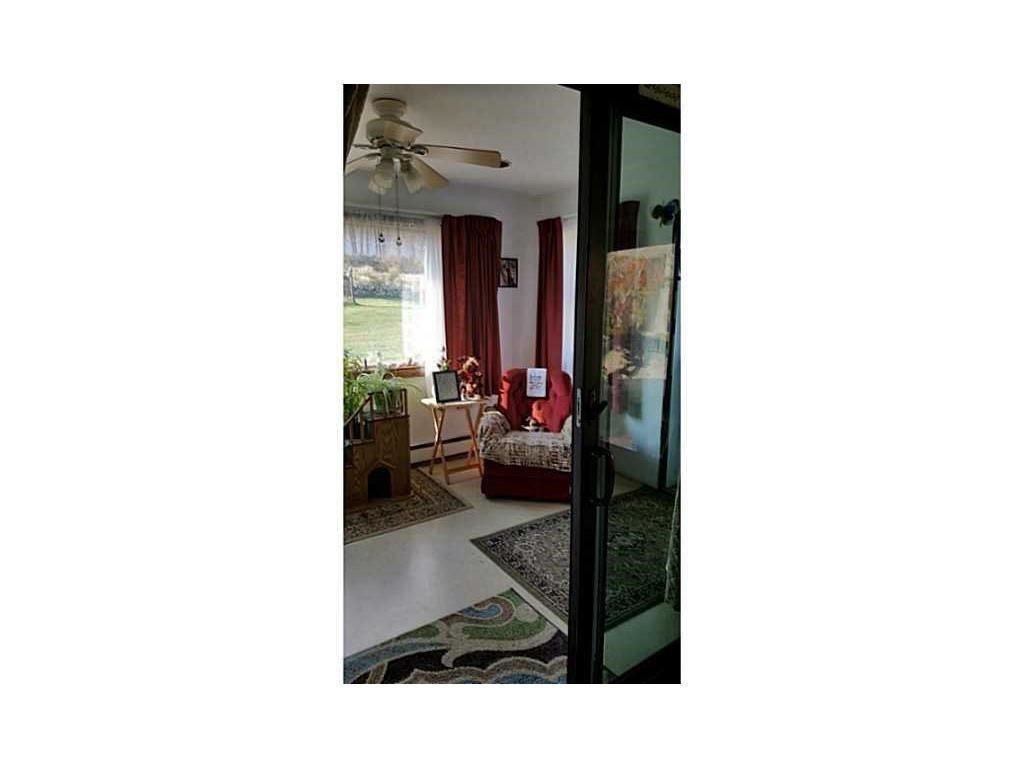 473 Klondike Road Charlestown, RI 02813 - Photo 2 of 18 Sun room, covered porch
