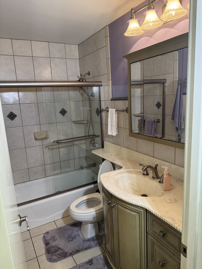 2527 Keystone Avenue North Riverside, IL 60546 - Photo 21 of 33 a bathroom with a sink toilet and shower