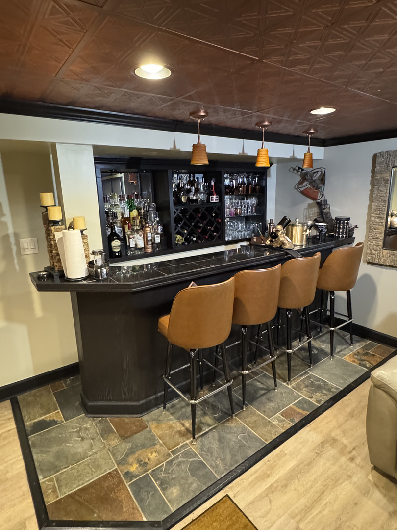 2527 Keystone Avenue North Riverside, IL 60546 - Photo 25 of 33 a dining room with furniture and a floor to ceiling window