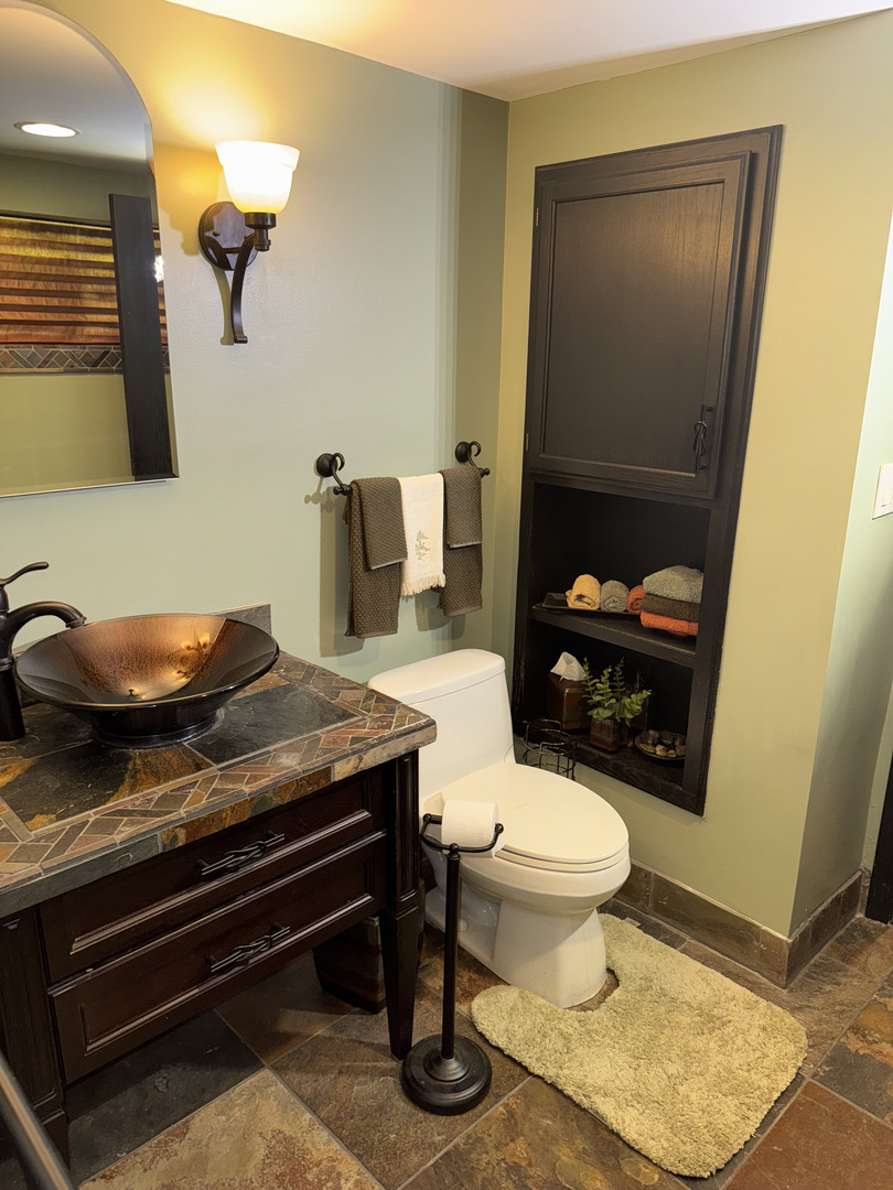 2527 Keystone Avenue North Riverside, IL 60546 - Photo 27 of 33 a bathroom with a sink toilet and mirror
