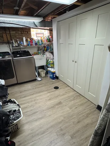 a storage room with washer and dryer