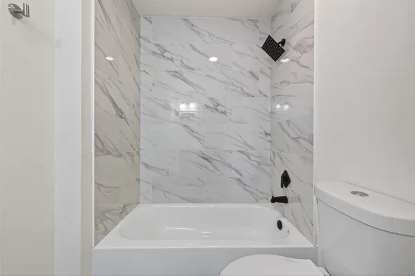 a bathroom with a bathtub