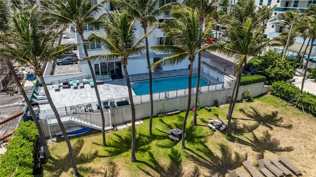 a view of swimming pool with patio