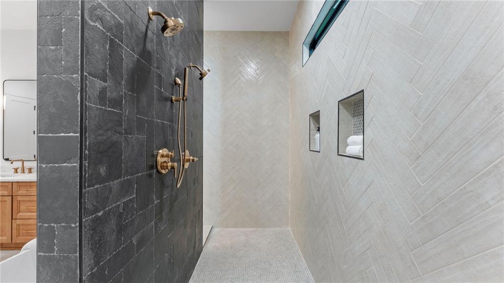 165 Highlands Chase Ball Ground, GA 30107 - Photo 16 of 40 a bathroom with a shower