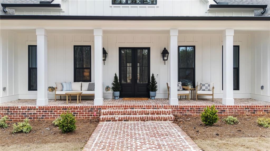 165 Highlands Chase Ball Ground, GA 30107 - Photo 2 of 40 a view of a building with a potted plant