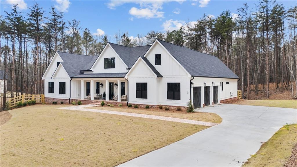 165 Highlands Chase Ball Ground, GA 30107 - Photo 40 of 40 a front view of a house with entertaining space