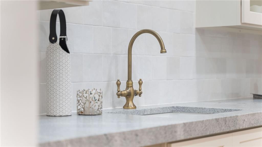 165 Highlands Chase Ball Ground, GA 30107 - Photo 9 of 40 a close view of sink and tap