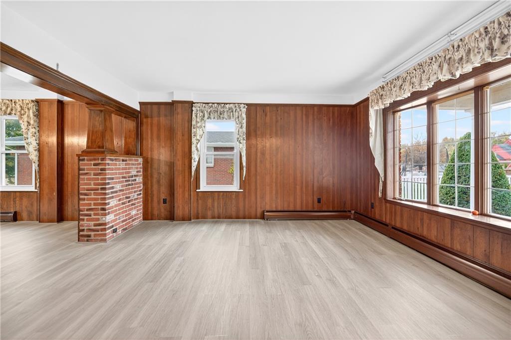 815 Washington Road Belle Vernon, PA 15012 - Photo 13 of 50 an empty room with wooden floor and windows