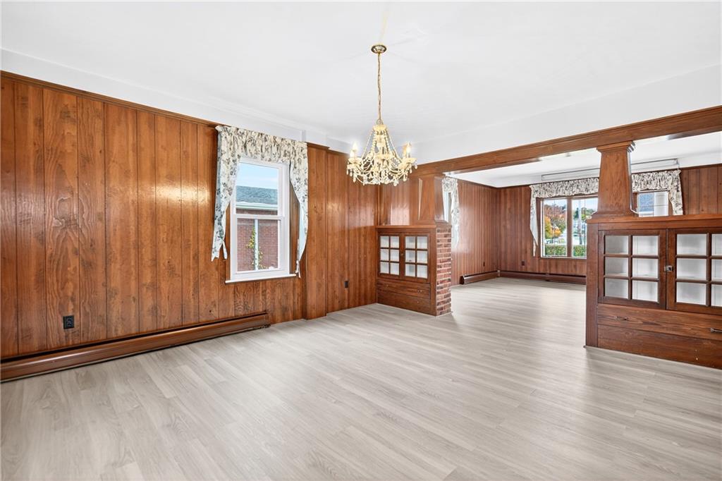 815 Washington Road Belle Vernon, PA 15012 - Photo 18 of 50 a view of an empty room with window and wooden floor