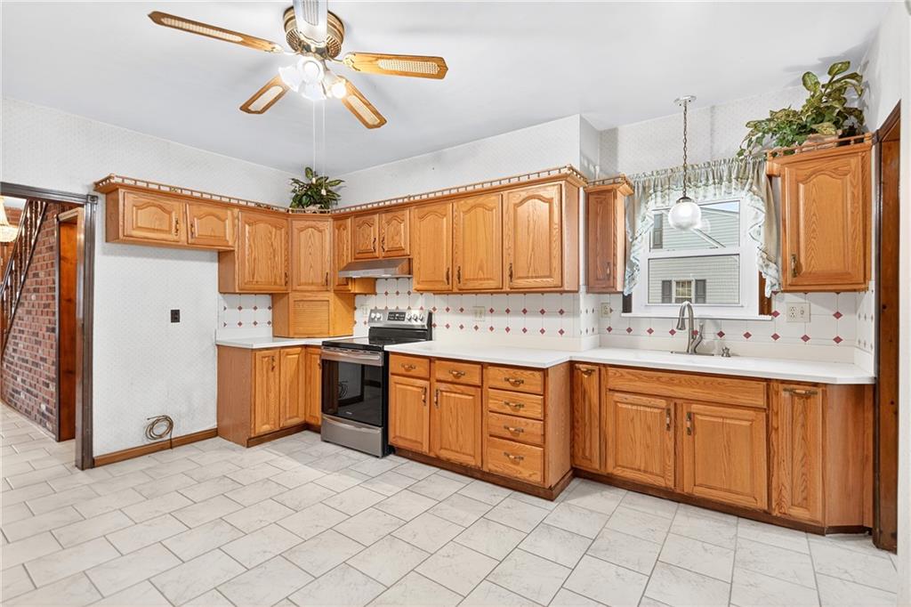 815 Washington Road Belle Vernon, PA 15012 - Photo 20 of 50 a kitchen with a sink appliances and cabinets