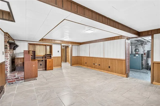 a view of a room with cabinet and refrigerator