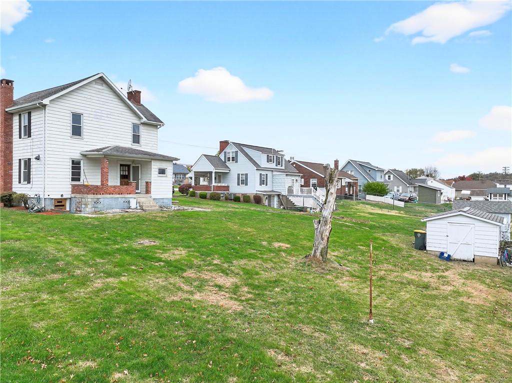 815 Washington Road Belle Vernon, PA 15012 - Photo 43 of 50 a view of a house with a yard and sitting area