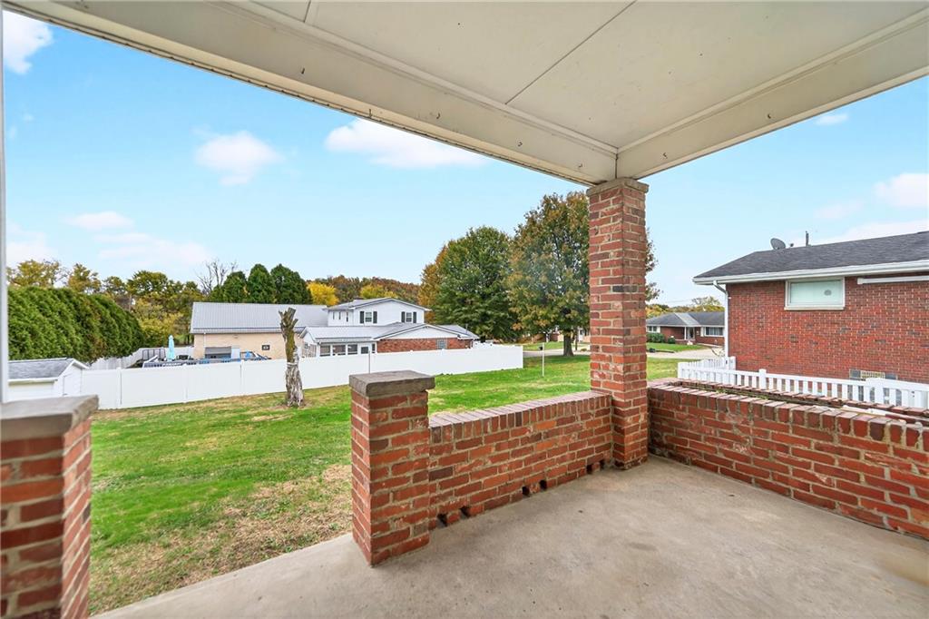 815 Washington Road Belle Vernon, PA 15012 - Photo 9 of 50 a view of a porch with furniture and garden