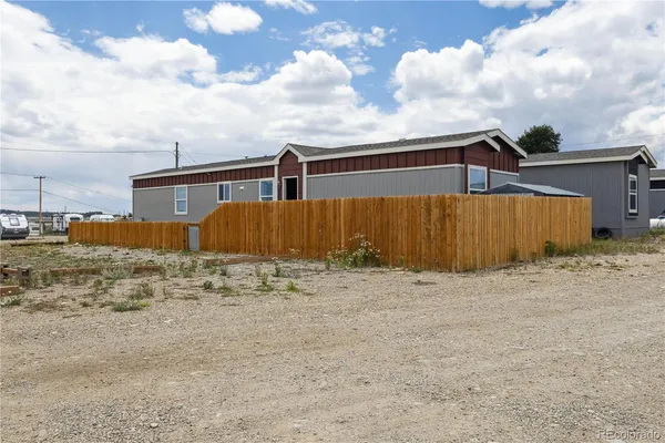 a street view with wooden fence