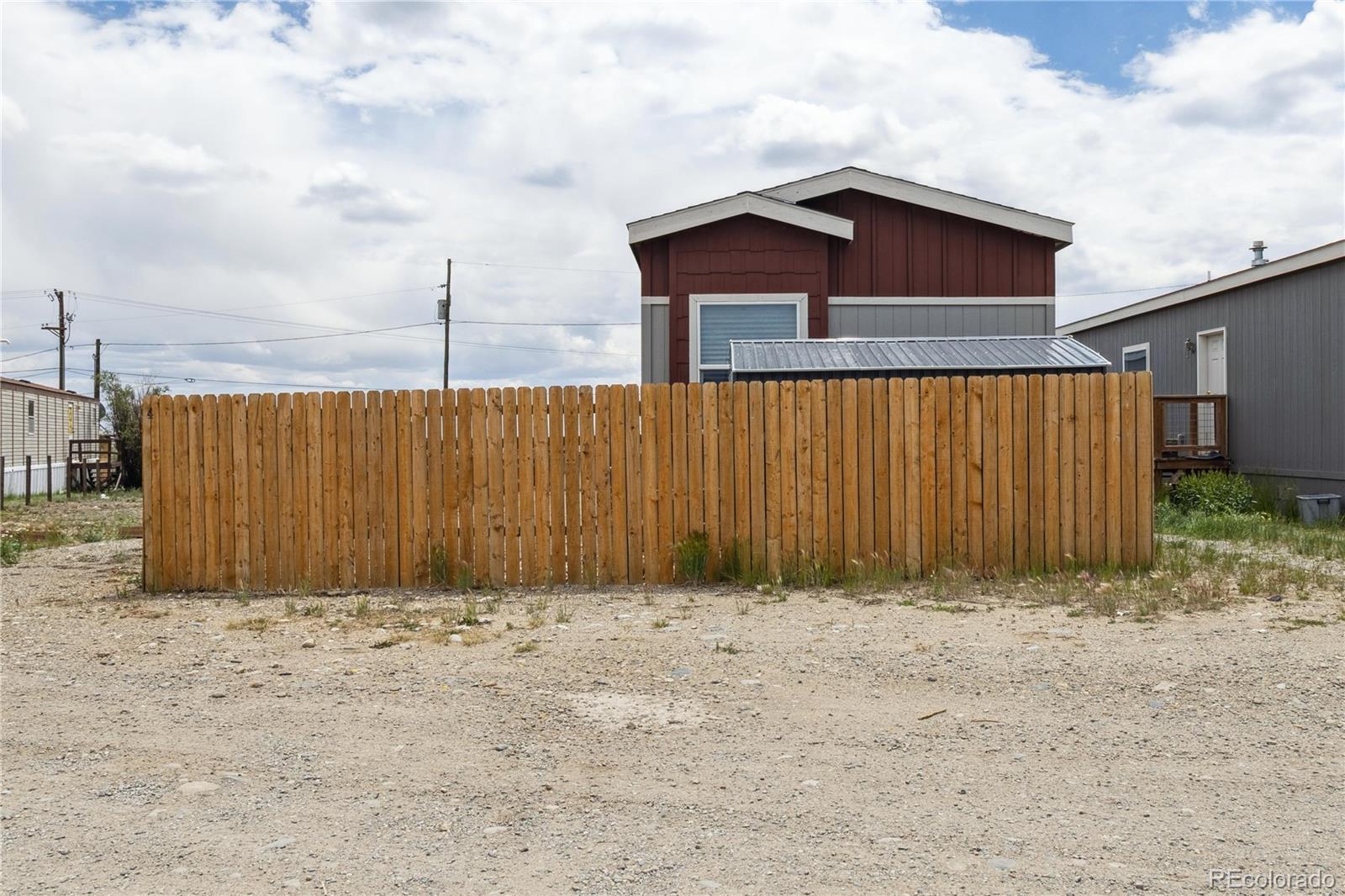 125 12th Street Fairplay, CO 80440 - Photo 5 of 31 a front view of a house with a yard