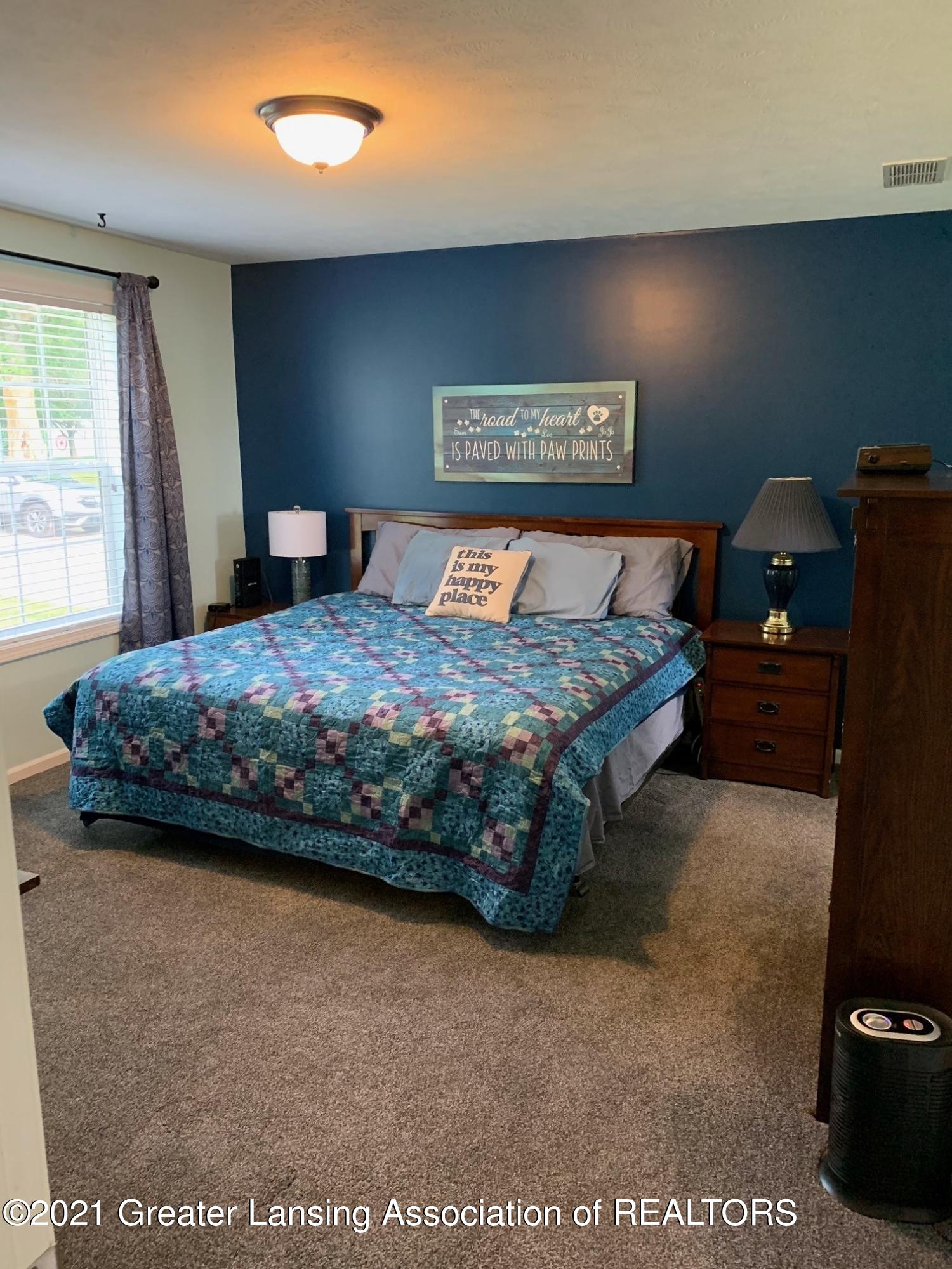 4050 Matthews Road Charlotte, MI 48813 - Photo 12 of 35 Primary Bedroom (Shown with King Size Be