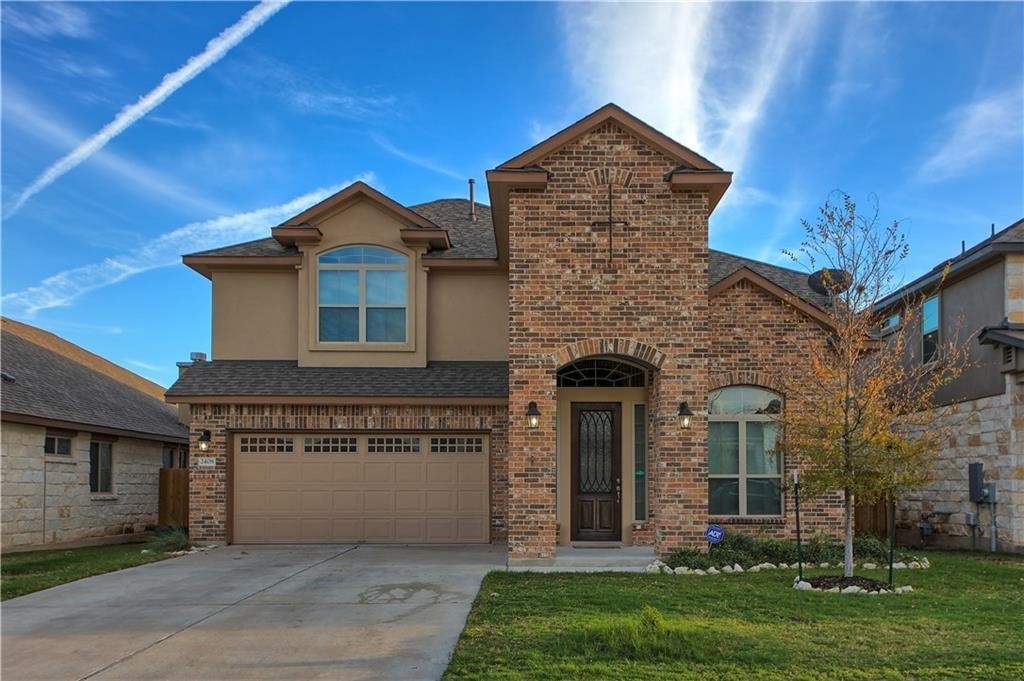 2408 Muzzie Lane Leander, TX 78641 - Photo 1 of 1 a front view of a house with garden