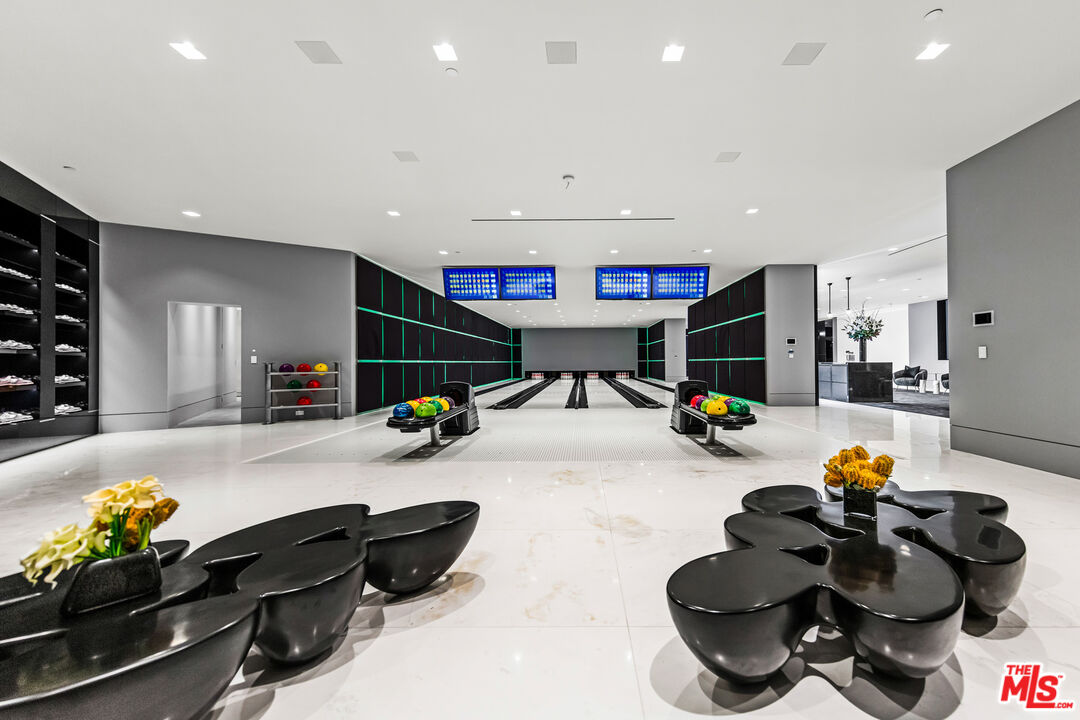 944 Airole Way Los Angeles, CA 90077 - Photo 16 of 30 a room with furniture and gym equipment