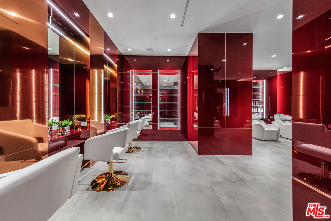 944 Airole Way Los Angeles, CA 90077 - Photo 23 of 30 a very nice looking living room with gym equipment