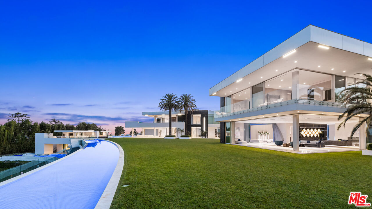 944 Airole Way Los Angeles, CA 90077 - Photo 26 of 30 a view of a big building with a big yard