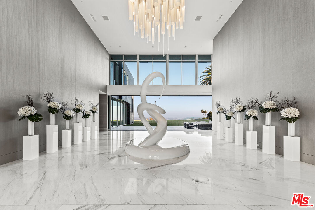 944 Airole Way Los Angeles, CA 90077 - Photo 4 of 30 a vase of flowers sitting on a table