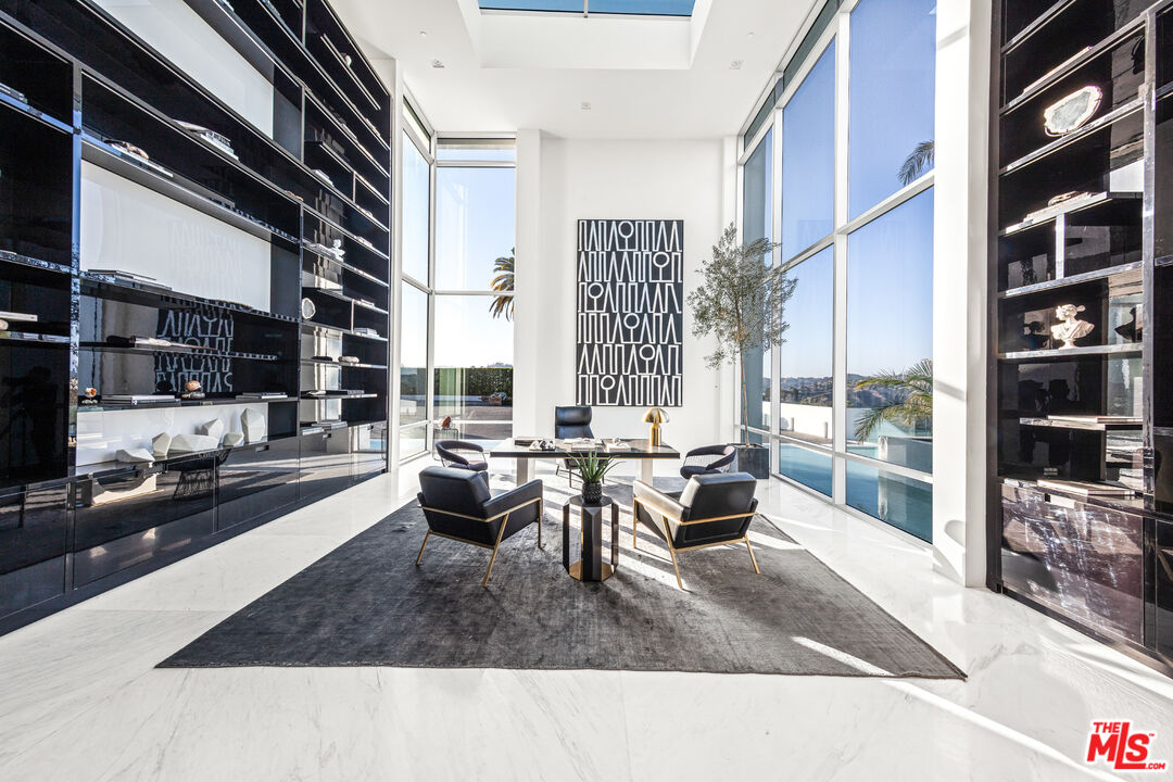 944 Airole Way Los Angeles, CA 90077 - Photo 6 of 30 a living room with furniture