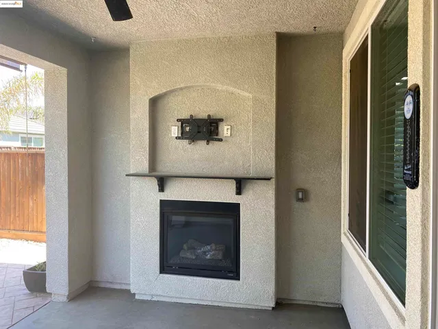 a view of an entryway with a fireplace