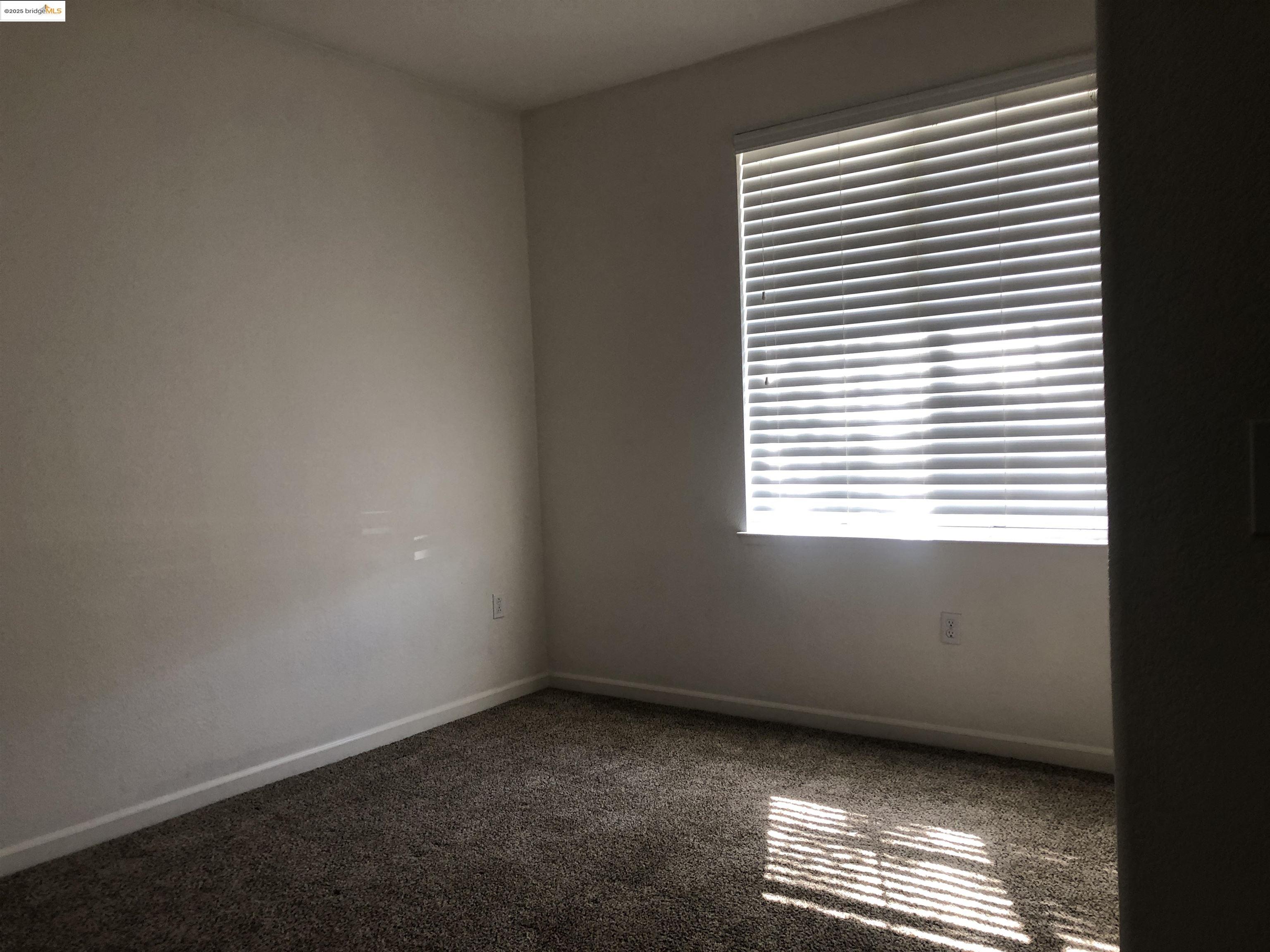 9821 Key W Way Discovery Bay, CA 94505 - Photo 9 of 14 a view of an empty room with a window