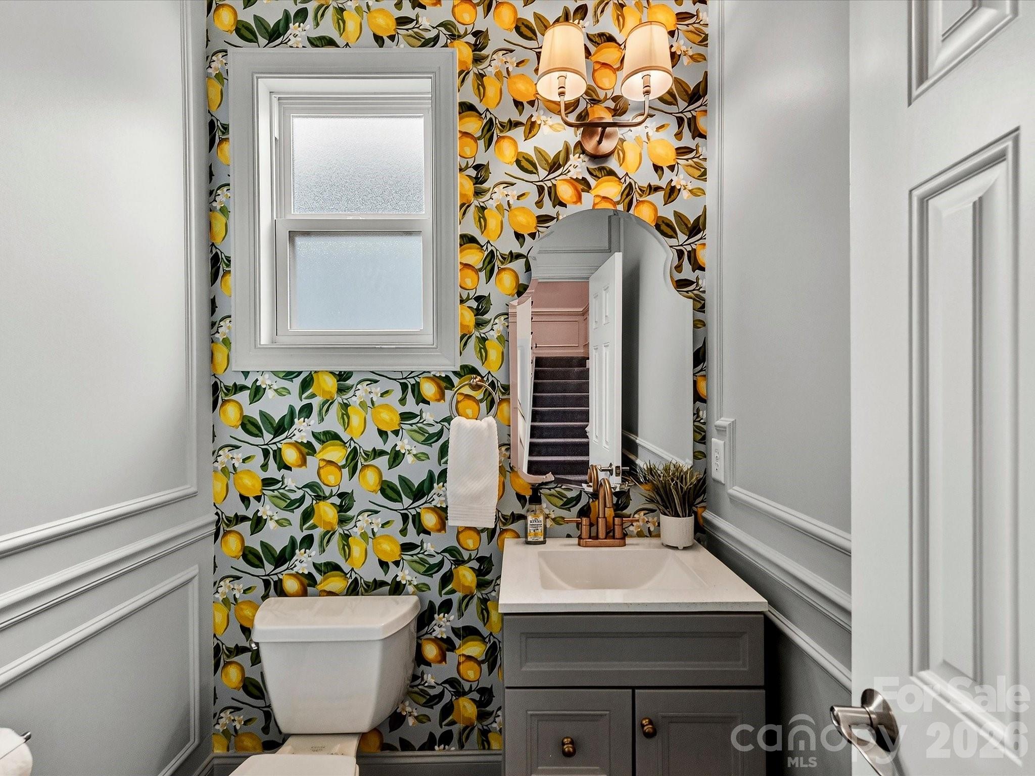 10030 Triple Oak Road Charlotte, NC 28277 - Photo 28 of 48 a bathroom with a sink toilet and mirror