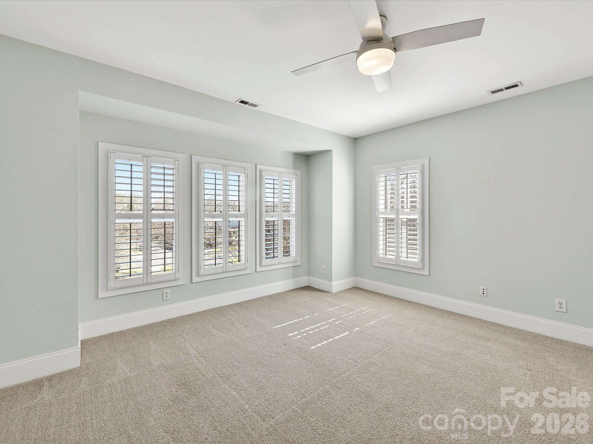 10030 Triple Oak Road Charlotte, NC 28277 - Photo 34 of 48 a view of an empty room with a window