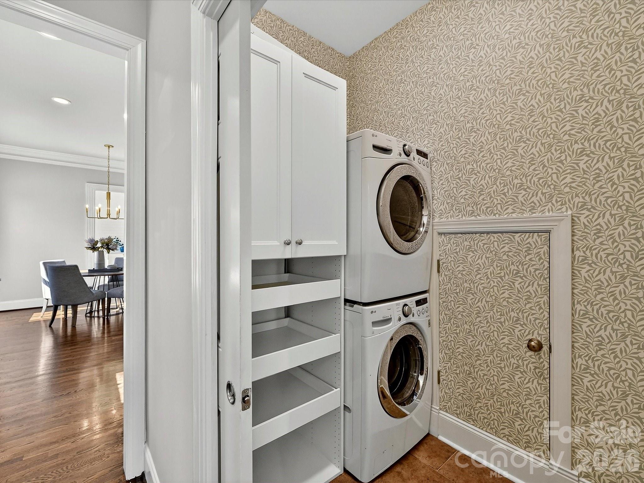 10030 Triple Oak Road Charlotte, NC 28277 - Photo 39 of 48 a utility room with dryer and washer