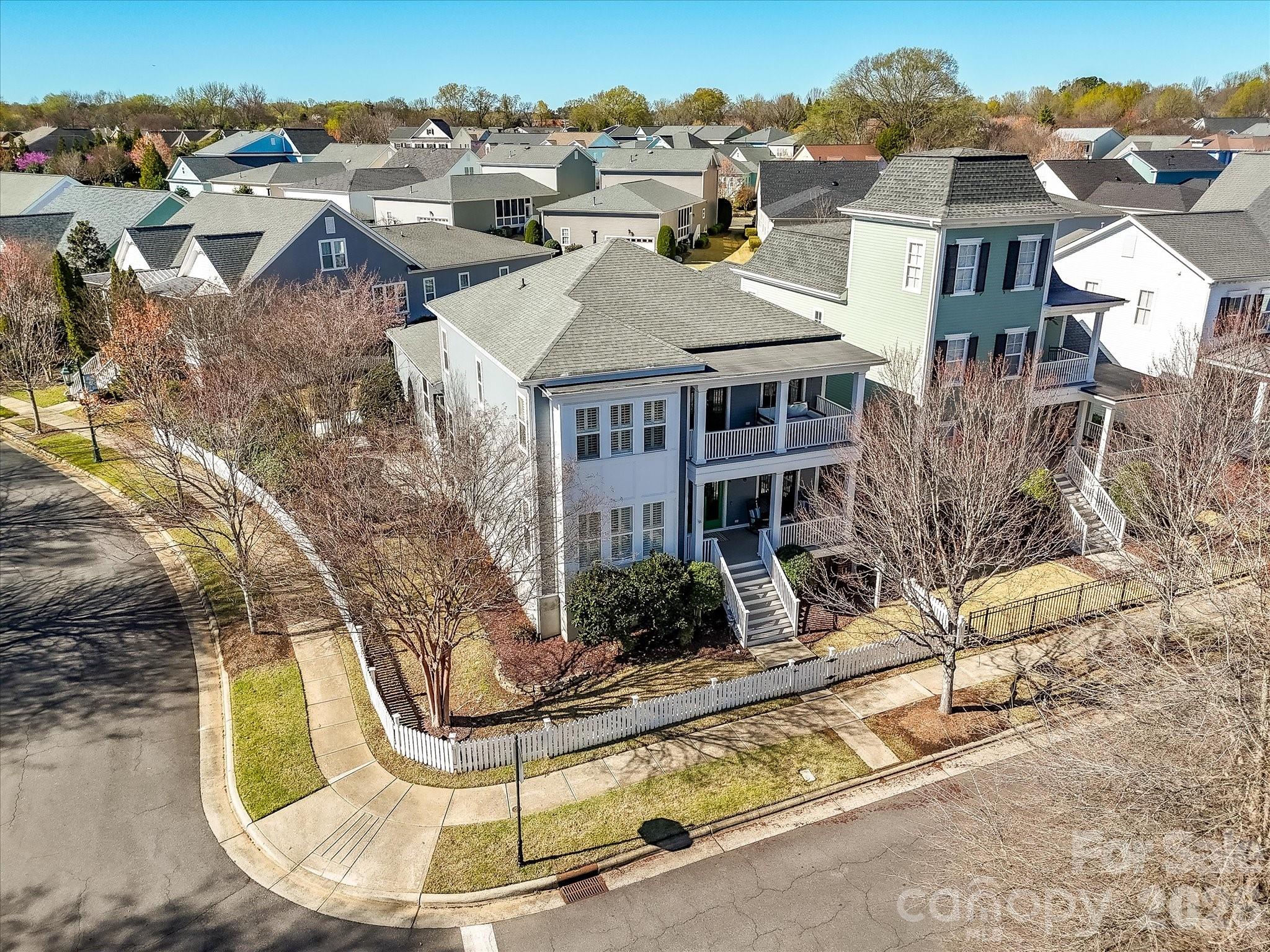 10030 Triple Oak Road Charlotte, NC 28277 - Photo 45 of 48 a aerial view of a house with a swimming pool and lawn chairs