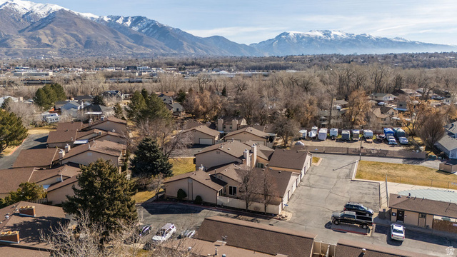 621 Coachman Way Riverdale, UT 84405 - Photo 36 of 38 Aerial perspective of suburban area featuring a mountainous background