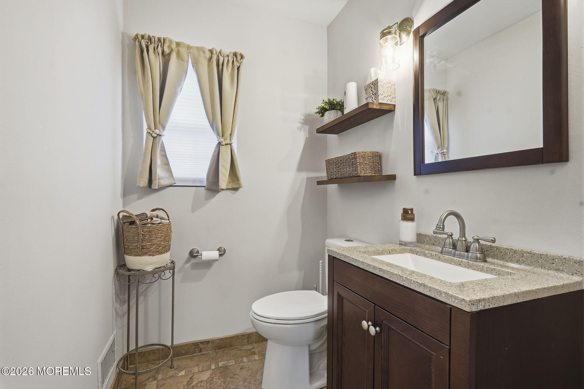 438 Bennetts Mills Road Jackson, NJ 08527 - Photo 14 of 42 a bathroom with a toilet sink and mirror
