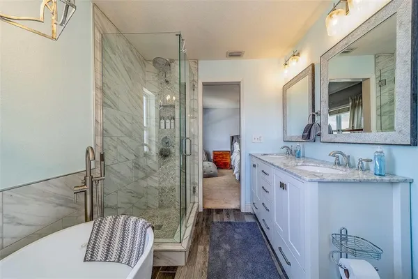 a bathroom with a shower and a toilet