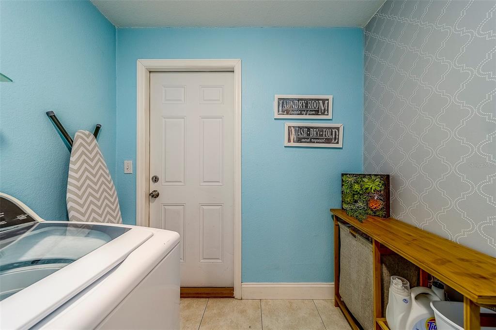 14414 91st Avenue North Seminole, FL 33776 - Photo 26 of 58 a view of kitchen with stainless steel appliances cabinets and a window